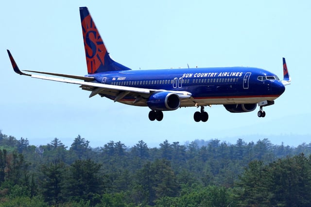 A Sun Country Airlines plane approaches Manchester Boston Regional Airport, in Manchester, N.H., on June 2, 2023.