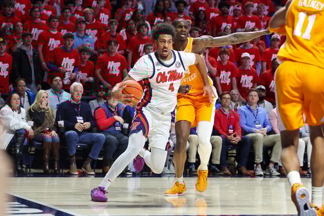 Mar 5, 2025; Oxford, Mississippi, USA; Mississippi Rebels forward Jaemyn Brakefield (4) drives to the basket against Tennessee Volunteers forward Felix Okra (34) during the second half at The Sandy and John Black Pavilion at Ole Miss. Mandatory Credit: Wesley Hale-Imagn Images
