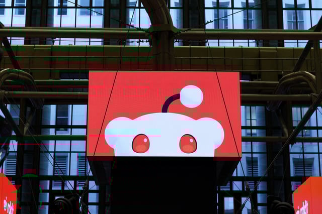 Reddit's logo is displayed, at the New York Stock Exchange (NYSE) in New York City, U.S., March 21, 2024. REUTERS/Brendan McDermid/File Photo
