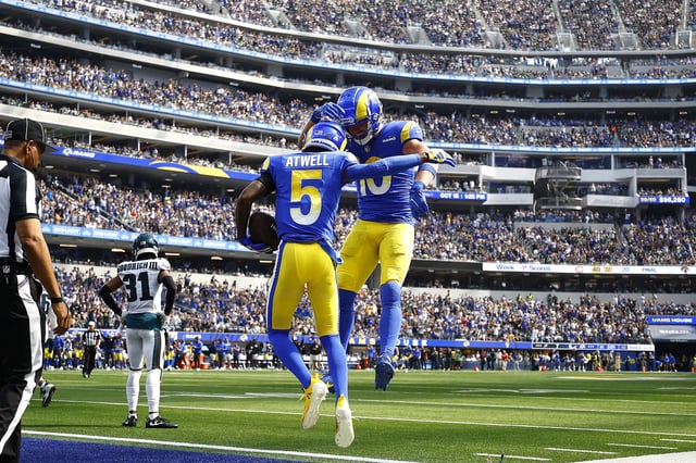 INGLEWOOD, CALIFORNIA - OCTOBER 08: Tutu Atwell #5 and Cooper Kupp #10 of the Los Angeles Rams celebrate after Atwell scored a touchdown in the first quarter against the Philadelphia Eagles at SoFi Stadium on October 08, 2023 in Inglewood, California.