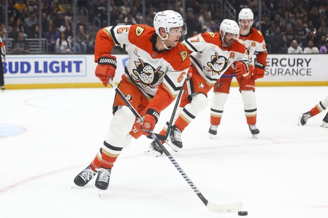 Feb 8, 2025; Los Angeles, California, USA; Anaheim Ducks defenseman Brian Dumoulin (6) skates with the puck against the Los Angeles Kings during the second period of a hockey game at Crypto.com Arena. Mandatory Credit: Jessica Alcheh-Imagn Images/File Photo