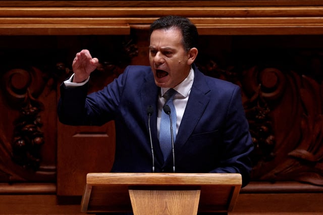 Portugal's Prime Minister Luis Montenegro speaks in parliament in Lisbon, Portugal, February 21, 2025. REUTERS/Pedro Nunes/File Photo