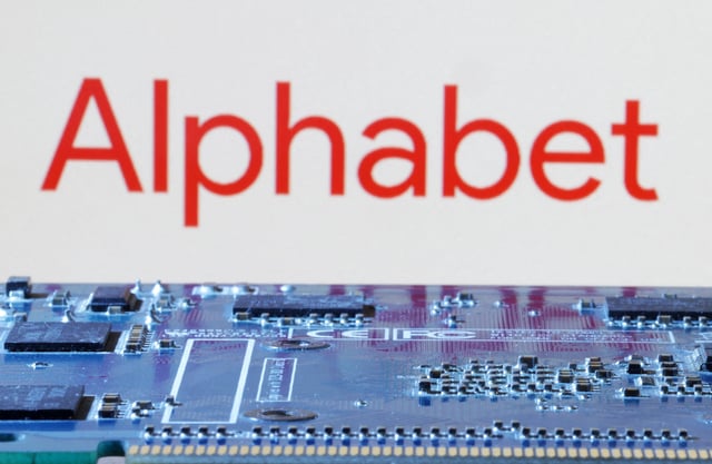Alphabet logo is seen near computer motherboard in this illustration taken January 8, 2024. REUTERS/Dado Ruvic/Illustration/File Photo