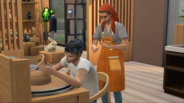 A screnshot featuring a Sim learning pottery in The Sims 4 Businesses & Hobbies.