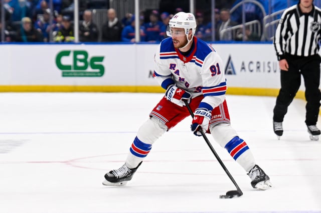 Feb 25, 2025; Elmont, New York, USA;  New York Rangers right wing Reilly Smith (91) looks to pass against the New York Islanders during the third period at UBS Arena. Mandatory Credit: Dennis Schneidler-Imagn Images/File Photo