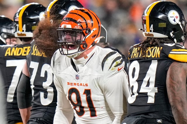Cincinnati Bengals defensive end Trey Hendrickson (91) celebrates a stop against the Pittsburgh Steelers in the fourth quarter of their Week 18 game at Acrisure Stadium last season.