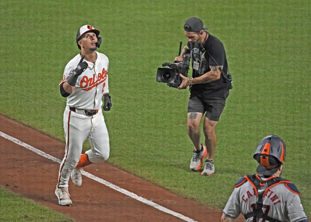 Orioles’ Ramon Urias celebrates his three-run home run against the Astros last season. He could prove valuable early in the 2025 season if shortstop Gunnar Henderson misses opening day because of a rib injury. (Kenneth K. Lam/Staff)
