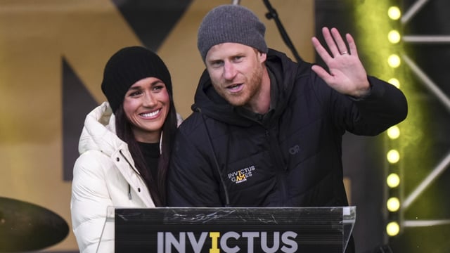 Prince Harry and his wife Meghan, the Duke and Duchess of Sussex, attend a welcome celebration during the 2025 Invictus Games, in Whistler, British Columbia, Monday, Feb. 10, 2025. (Darryl Dyck/The Canadian Press via AP)