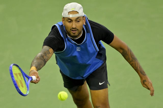 Mar 6, 2025; Indian Wells, CA, USA;  Nick Kyrgios (AUS) hits a shot against Botic Van De Zandschulp (not pictured) during his first round match of the BNP Paribas Open at the Indian Well Tennis Garden. Mandatory Credit: Jayne Kamin-Oncea-Imagn Images