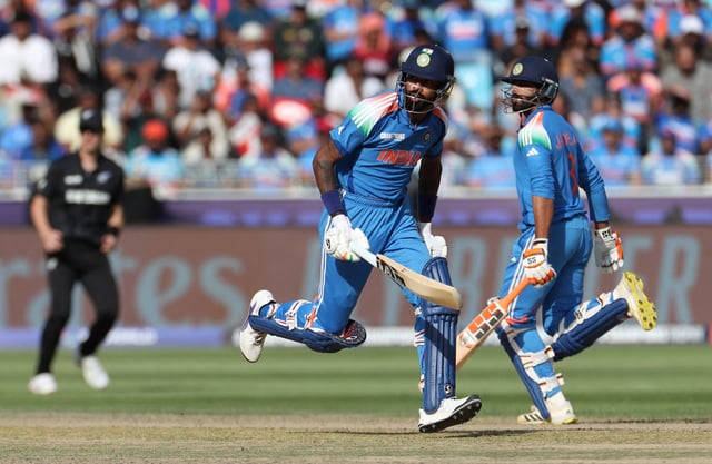 Cricket - ICC Men's Champions Trophy - Group A - India v New Zealand - Dubai International Stadium, Dubai, United Arab Emirates - March 2, 2025 India's Hardik Pandya and Ravindra Jadeja in action REUTERS/Satish Kumar/File Photo