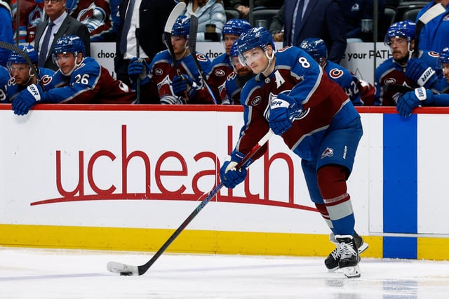 Mar 6, 2025; Denver, Colorado, USA; Colorado Avalanche defenseman Cale Makar (8) controls the puck in the third period against the San Jose Sharks at Ball Arena. Mandatory Credit: Isaiah J. Downing-Imagn Images