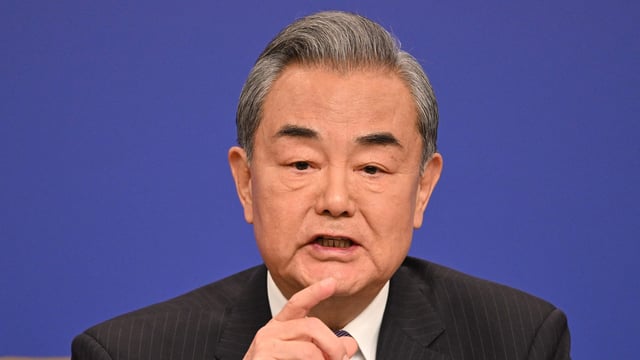 China's Foreign Minister Wang Yi speaks at a press conference during the ongoing National People's Congress (NPC) in Beijing on March 7, 2025.
