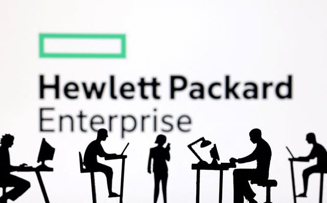 Figurines with computers and smartphones are seen in front of Hewlett Packard Enterprise logo in this illustration taken, February 19, 2024. REUTERS/Dado Ruvic/Illustration/File Photo