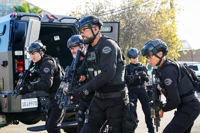 David Lim as Victor Tan, Jay Harrington as David "Deacon" Kay, Shemar Moore as Daniel "Hondo" Harrelson and Annie Ilonzeh as Devin Gamble on CBS Television Network's "S.W.A.T.," now canceled.