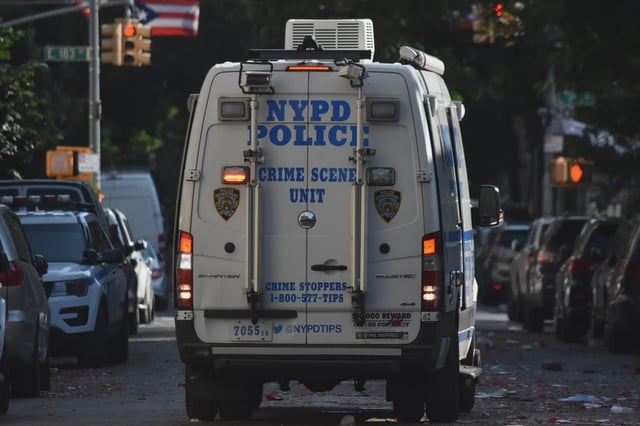 An NYPD Crime Scene Unit van drives through the Bronx on July 5, 2023.