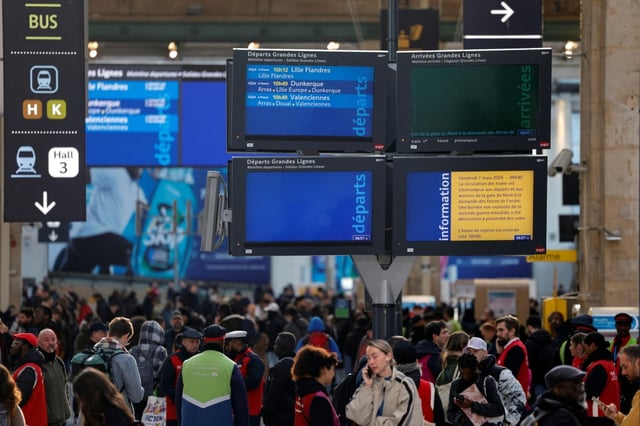 At Gare du Nord, station staff tried their best to reassure bewildered passengers