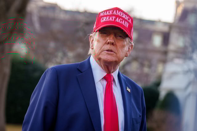 President Donald Trump takes a question from a reporter before boarding Marine One on the South Lawn of the White House on February 28, 2025, in Washington, D.C.