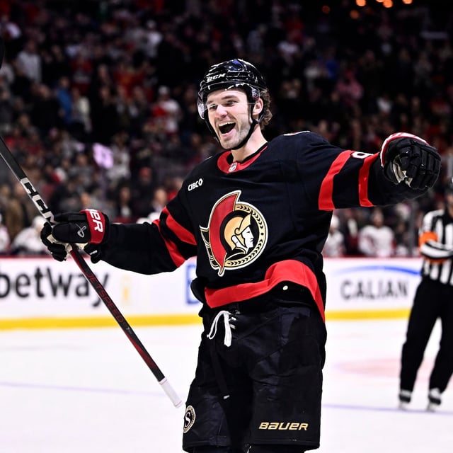Ottawa Senators' Josh Norris (9) celebrates a goal by Shane Pinto (12), not shown, during second-period NHL hockey action against the Washington Capitals in Ottawa, on Thursday, Jan. 30, 2025. THE CANADIAN PRESS/Justin Tang