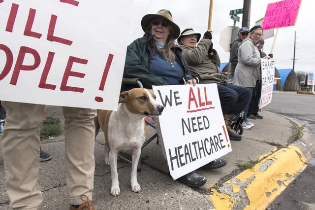 Protesters hold a small peaceful demonstration in support of health care on September 23, 2017 in Livingston, Montana.