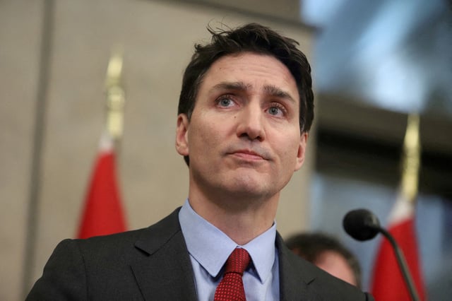 Canada's Prime Minister Justin Trudeau looks on during a press conference while responding to U.S. President Donald Trump's orders to impose 25% tariffs on Canadian imports, in Ottawa, Ontario, Canada February 1, 2025. 