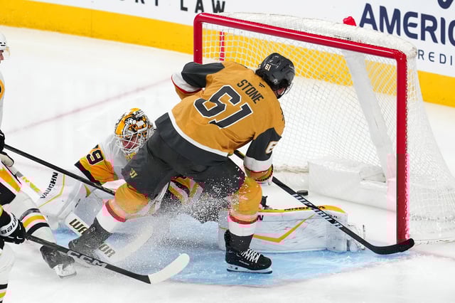 Mar 7, 2025; Las Vegas, Nevada, USA; Vegas Golden Knights right wing Mark Stone (61) scores a goal against Pittsburgh Penguins goaltender Alex Nedeljkovic (39) during the third period at T-Mobile Arena. Mandatory Credit: Stephen R. Sylvanie-Imagn Images