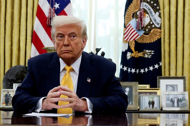 U.S. President Donald Trump sits in the Oval Office of the White House in Washington, D.C., U.S., March 7, 2025. REUTERS/Leah Millis/File Photo