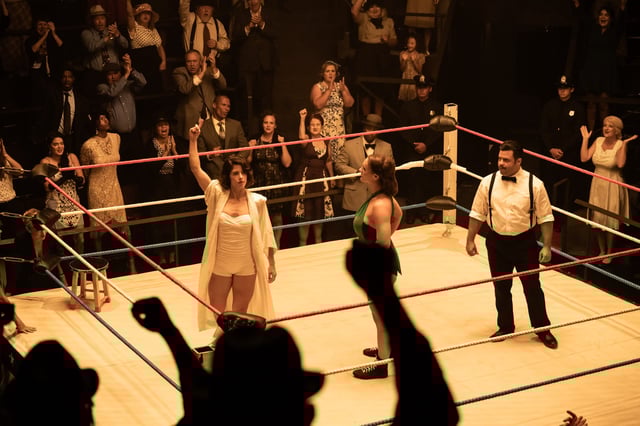 Mildred Burke (Emily Bett Rickards, left in ring) wrestles rival June Byers (Kailey Latimer) in a key 1954 match in "Queen of the Ring."