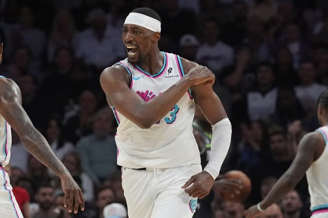 Miami Heat center Bam Adebayo (13) gestures after scoring during the second half of an NBA basketball game against the Minnesota Timberwolves, Friday, March 7, 2025, in Miami. (AP Photo/Marta Lavandier)