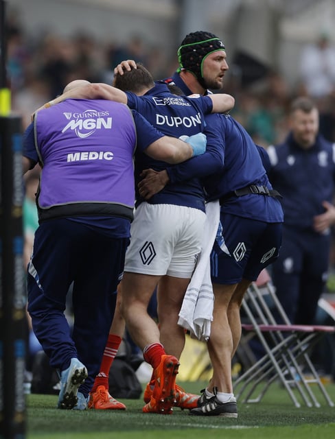 Rugby Union - Six Nations Championship - Ireland v France - Aviva Stadium, Dublin, Ireland - March 8, 2025 France's Antoine Dupont leaves the pitch with medical staff after sustaining an injury REUTERS/Clodagh Kilcoyne
