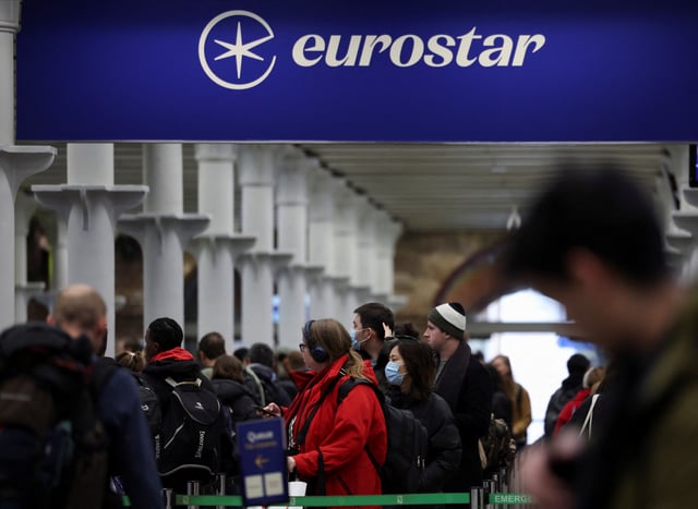 Passengers queue at the departure gates of the Eurostar terminal at St Pancras International Station in London, Britain, December 22, 2023. REUTERS/Isabel Infantes/File Photo