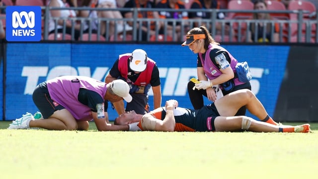 Kieren Briggs is attended to by club doctors after suffering a head injury