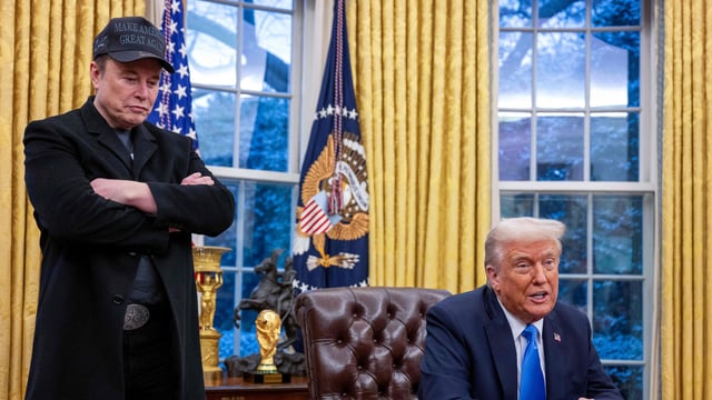 Elon Musk listens as US President Donald Trump speaks in the Oval Office of the White House in Washington, DC.