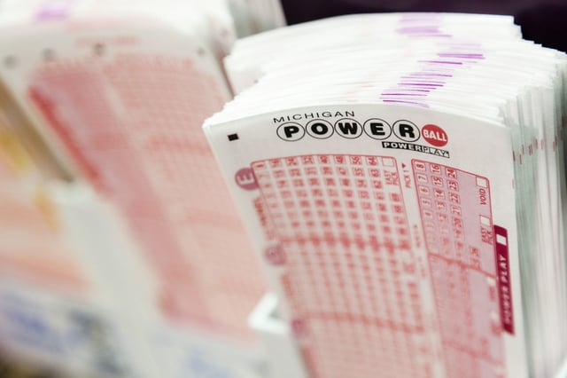 Slips for the Michigan Powerball sit on the counter at Jazz Liquor Store on Woodward in downtown Detroit on Wednesday Jan. 6, 2016.