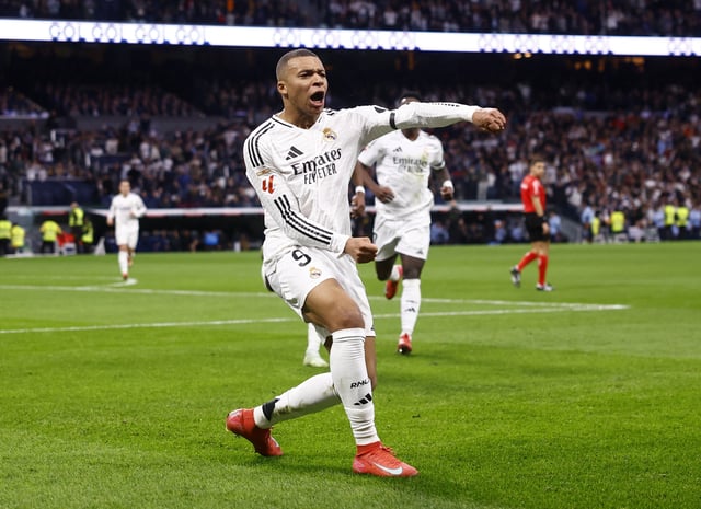 Soccer Football - LaLiga - Real Madrid v Rayo Vallecano - Santiago Bernabeu, Madrid, Spain - March 9, 2025 Real Madrid's Kylian Mbappe celebrates scoring their first goal REUTERS/Susana Vera