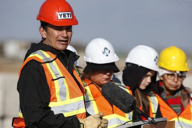 Manitoba Premier Wab Kinew speaks to the media at a search facility site with families of Morgan Harris and Marcedes Myran, at a landfill just north of Winnipeg. THE CANADIAN PRESS/John Woods