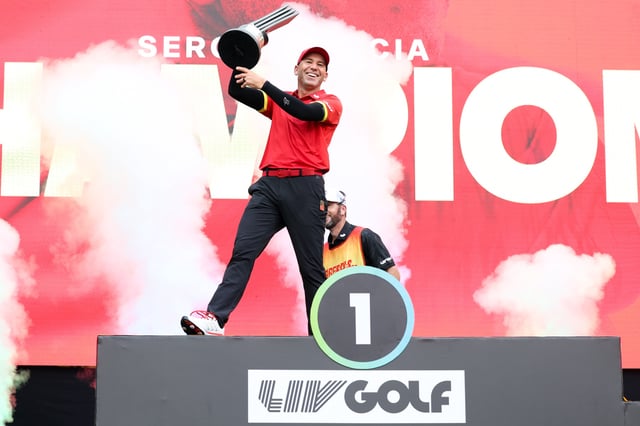 Sergio Garcia of Fireballs GC celebrates the champion during the award ceremony on day three of LIV Golf Hong Kong at The Hong Kong Golf Club on March 09, 2025 in Hong Kong, China.