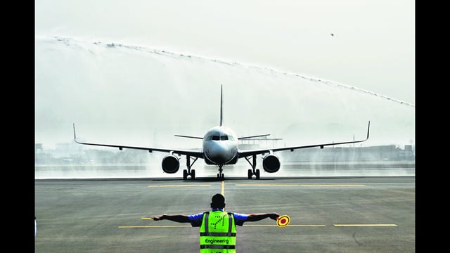 First commercial aircraft landing on the runway of Navi Mumbai International Airport Ltd at Ulwe in Navi Mumbai. (HT Photo)