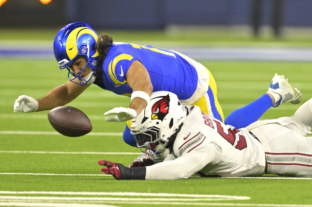 Dec 28, 2024; Inglewood, California, USA;   Arizona Cardinals linebacker Baron Browning (53) breaks up a pass for Los Angeles Rams wide receiver Puka Nacua (17) in the first half at SoFi Stadium. Jayne Kamin-Oncea-Imagn Images/File Photo