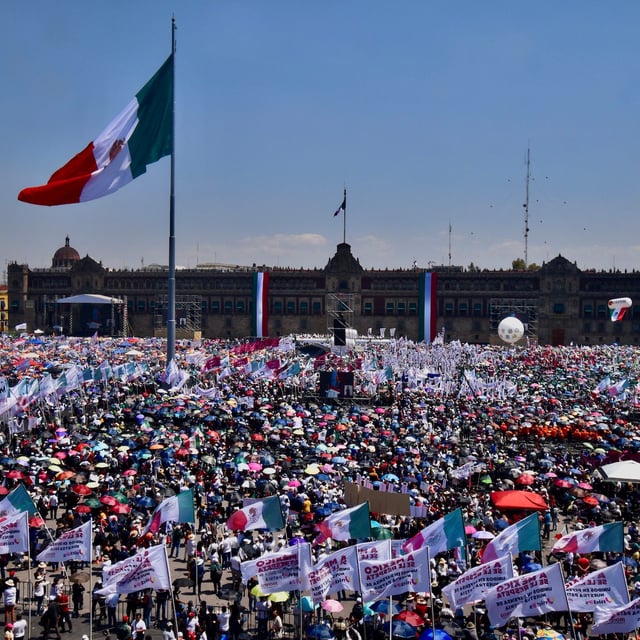 Supporters of Mexico's President Claudia Sheinbaum attend a rally at the Zocalo square in Mexico City on March 9, 2025. Sheinbaum credited "dialogue" for her US counterpart Donald Trump's decision to offer temporary relief on tariffs imposed on goods from her country, and she declared herself 'optimistic' about the future of the trade relationship, but also warned: 'We cannot give up our sovereignty'. (Photo by Haaron ALVAREZ / AFP) (Photo by HAARON ALVAREZ/AFP via Getty Images)