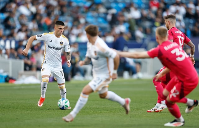 CARSON, CALIFORNIA – MARCH 09:  Gabriel Pec #11 of Los Angeles Galaxy controls the ball against St. Louis City SC in the first half at Dignity Health Sports Park on March 09, 2025 in Carson, California. (Photo by Ronald Martinez/Getty Images)