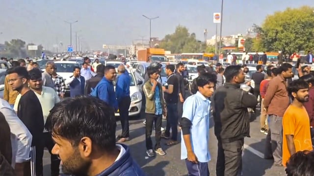 New Delhi: People during a protest by residents of Ghazipur on Akshardham-Ghaziabad road against the alleged murder of a young man, in Delhi, Monday, March 10, 2025.