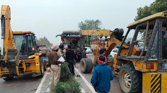 Efforts on to rescue passengers after a collision between a bus and a tractor-trolley near Jallowal village on the Jalandhar-Jammu highway early on Monday. (HT Photo)