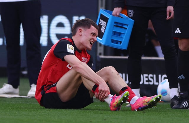 Soccer Football - Bundesliga - Bayer Leverkusen v Werder Bremen - BayArena, Leverkusen, Germany - March 8, 2025 Bayer Leverkusen's Florian Wirtz reacts after sustaining an injury REUTERS/Thilo Schmuelgen/File Photo