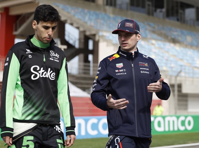 Formula One F1 - Pre Season Testing - Bahrain International Circuit, Sakhir, Bahrain - February 26, 2025 Red Bull's Max Verstappen with Sauber's Gabriel Bortoleto ahead of testing REUTERS/Hamad I Mohammed/File Photo