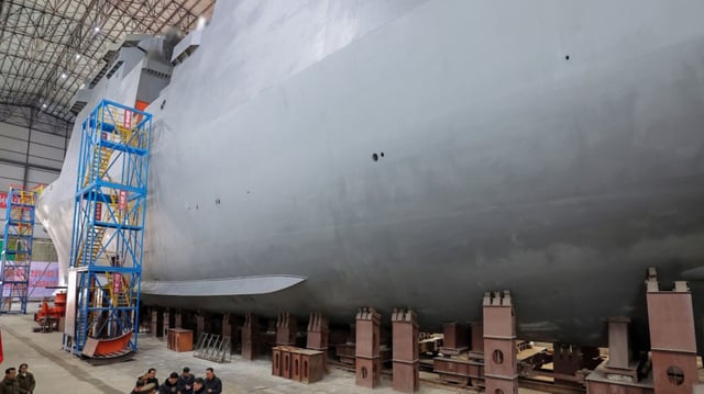 North Korea's under construction nuclear-powered submarine during Kim Jong Un's visit