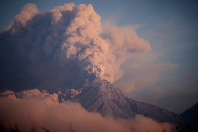 The "Volcan de Fuego," or Volcano of Fire, blows a thick cloud of ash seen from Palin, Guatemala, Monday, March 10, 2025. (AP Photo/Moises Castillo)