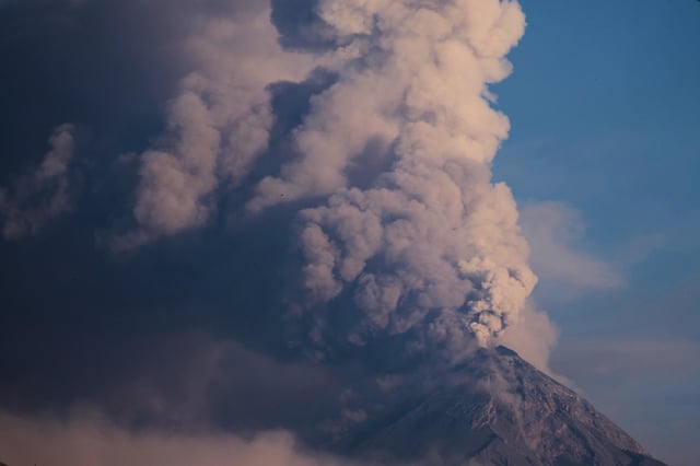 The "Volcan de Fuego," or Volcano of Fire, blows a thick cloud of ash, seen from Palin, Guatemala, Monday, March 10, 2025. (AP Photo/Moises Castillo)