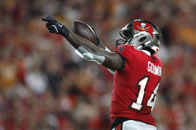 TAMPA, FLORIDA - OCTOBER 21: Chris Godwin #14 of the Tampa Bay Buccaneers reacts after making a first down during the second quarter against the Baltimore Ravens at Raymond James Stadium on October 21, 2024 in Tampa, Florida. 
Chris Godwin sustained a lower leg injury with less than a minute in the Week 7 matchup.