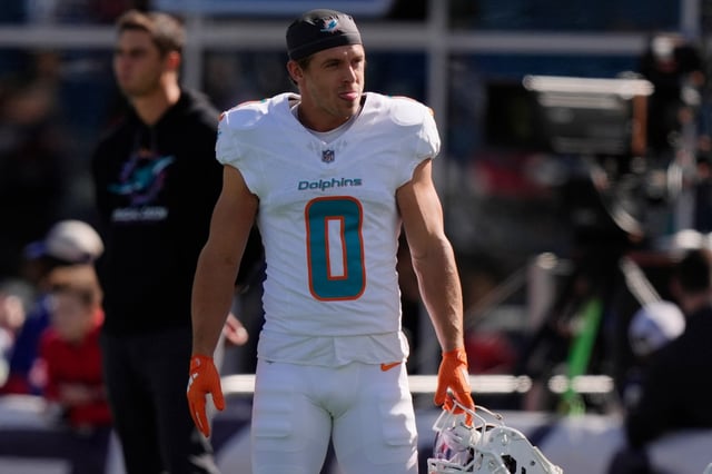 Miami Dolphins wide receiver Braxton Berrios (0) warms up prior to an NFL football game against the New England Patriots, Sunday, Oct. 6, 2024, in Foxborough, Mass. (AP Photo/Steven Senne)
