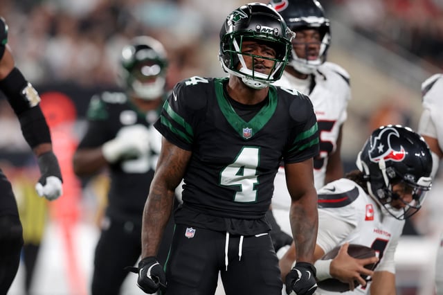Oct 31, 2024; East Rutherford, New Jersey, USA; New York Jets cornerback D.J. Reed (4) reacts after sacking Houston Texans quarterback C.J. Stroud (7) during the first quarter at MetLife Stadium. Mandatory Credit: Brad Penner-Imagn Images/File Photo